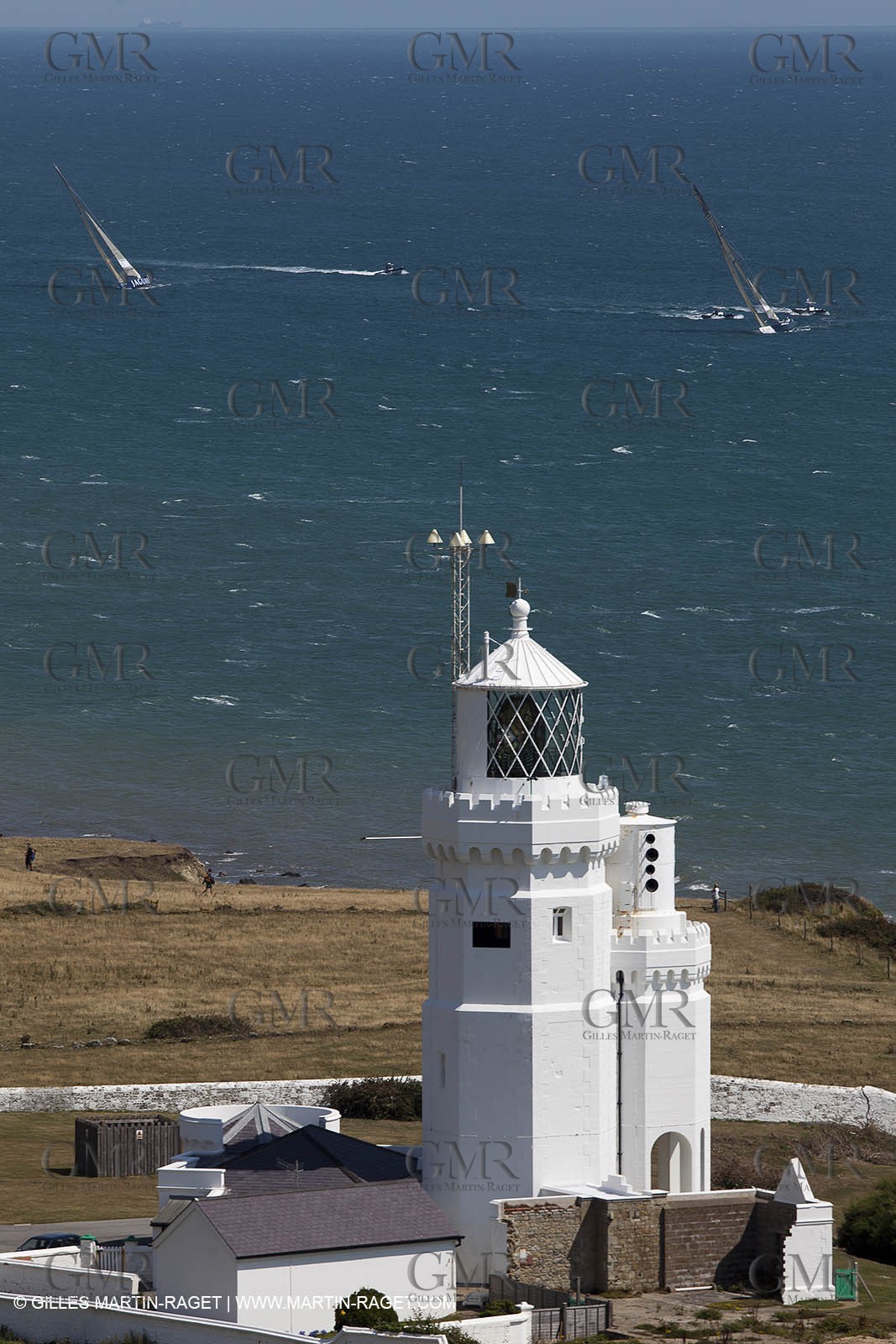 05 08 2010 - Cowes (UK, IOW) - The 1851 Cup -  BMW ORACLE Racing -  - Round The Island Race - Passing Ste Catherine Lighthouse.