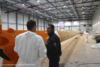 Vannes - Multiplast Boatyard - Orange II going out of the shed