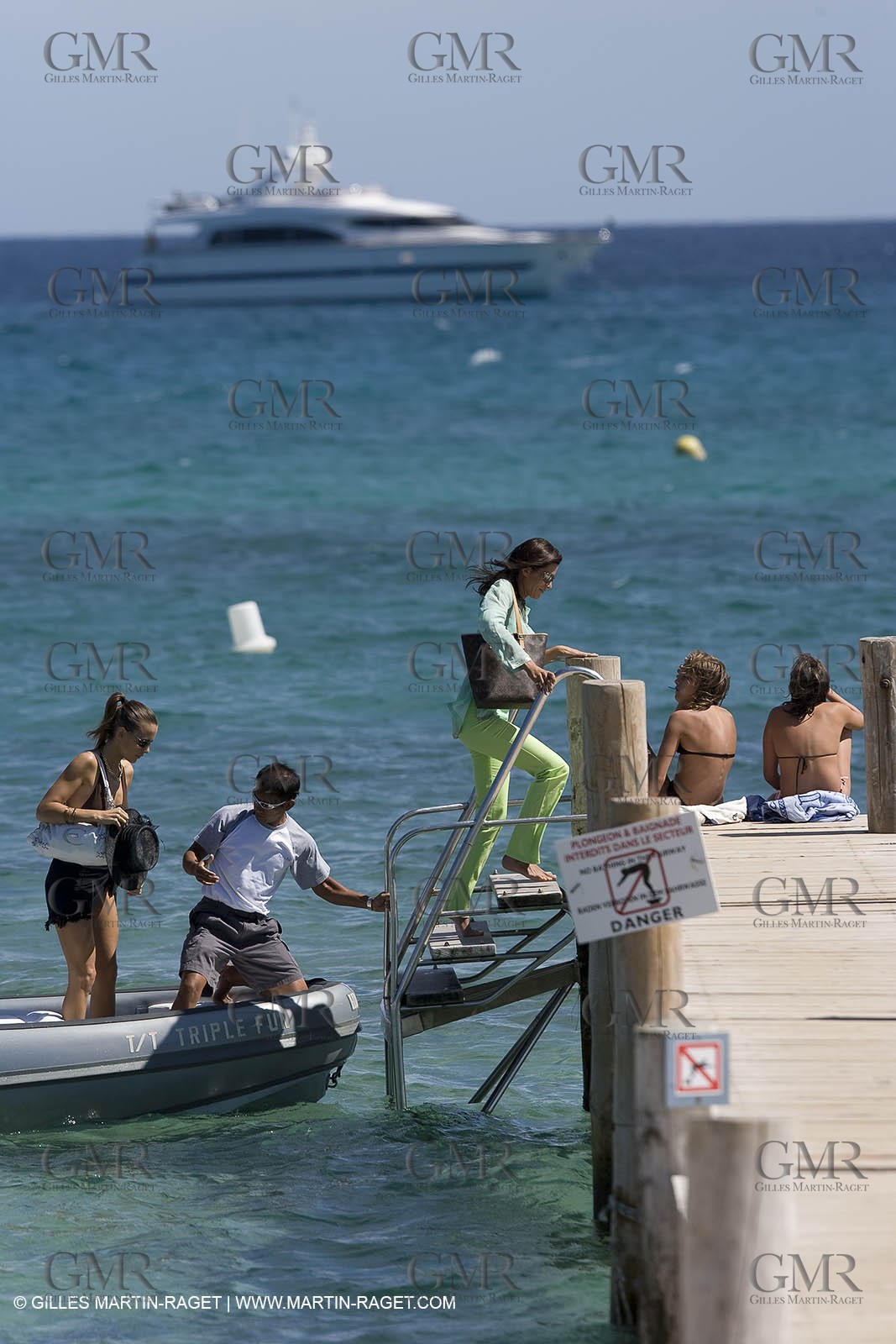 06 09 2007 - Saint Tropez (FRA, 83) - Superyachts - Motoryachts - Mangusta 92 Triple Fun in Saint Tropez - Mooring at Club 55 at Pampelonne Beach
