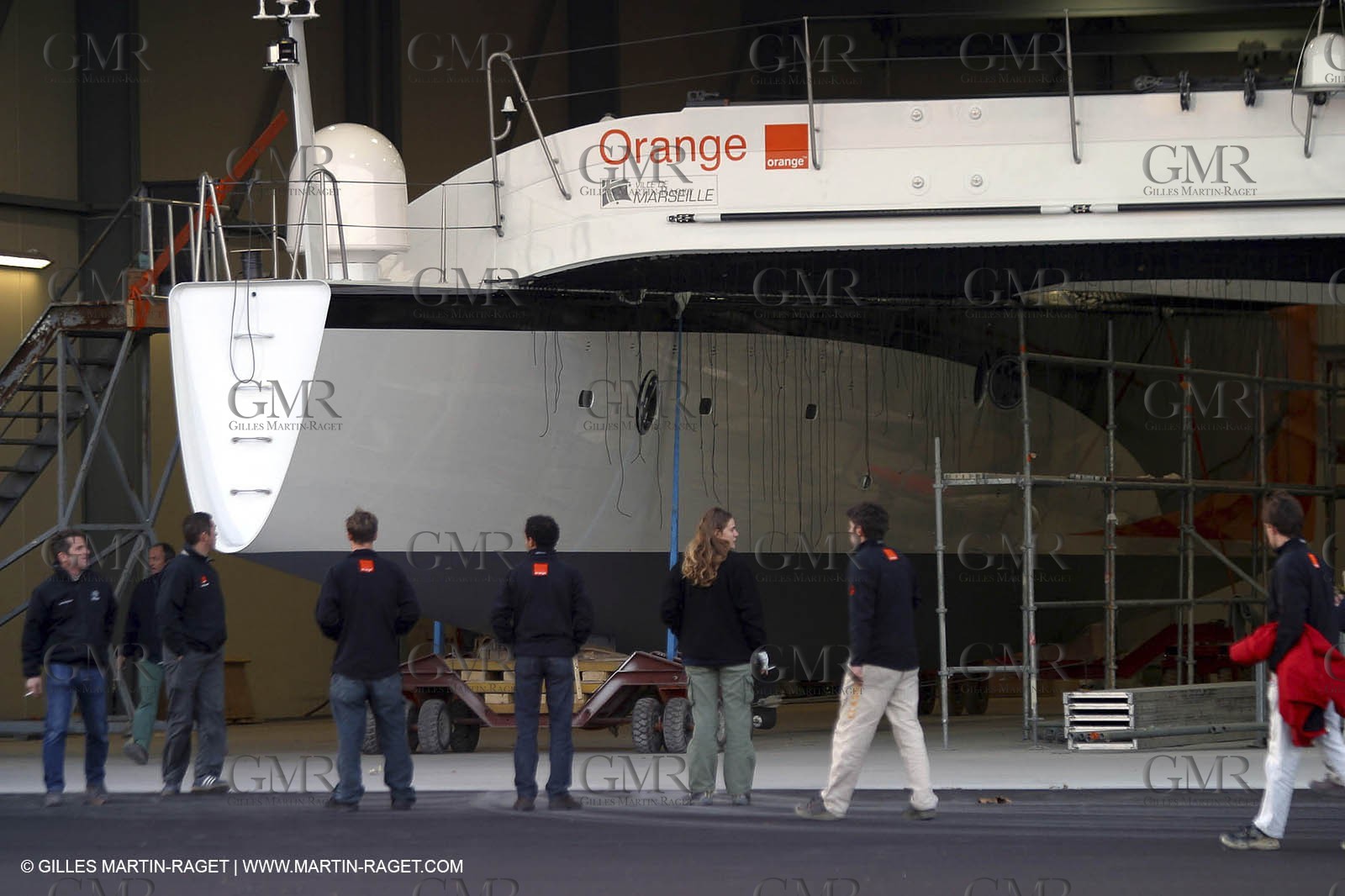 Vannes - Multiplast Boatyard - Orange II going out of the shed