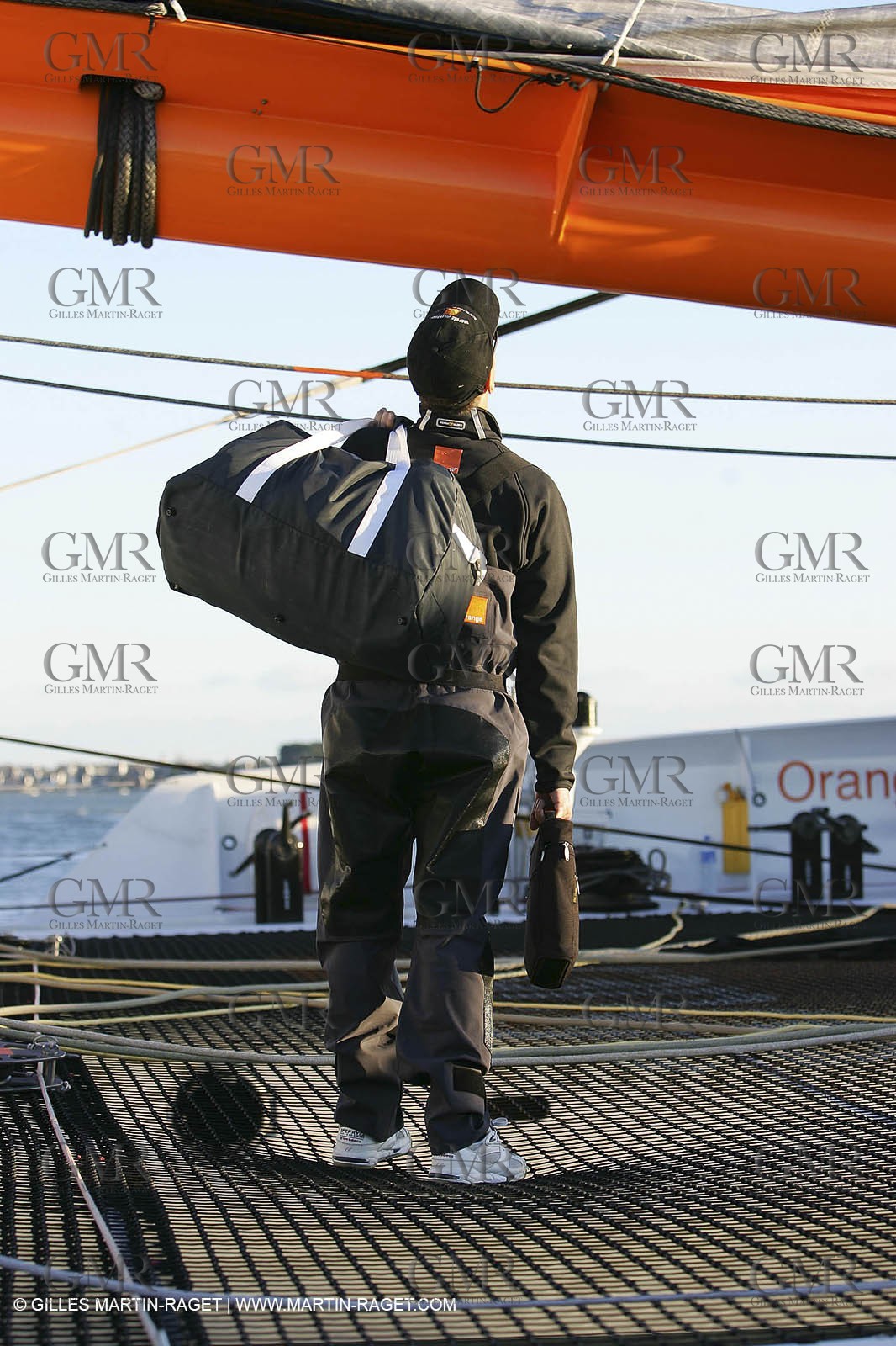 Orange II-2005 Jules Verne Trophy-Start from Lorient-Bruno Peyron look to the sails