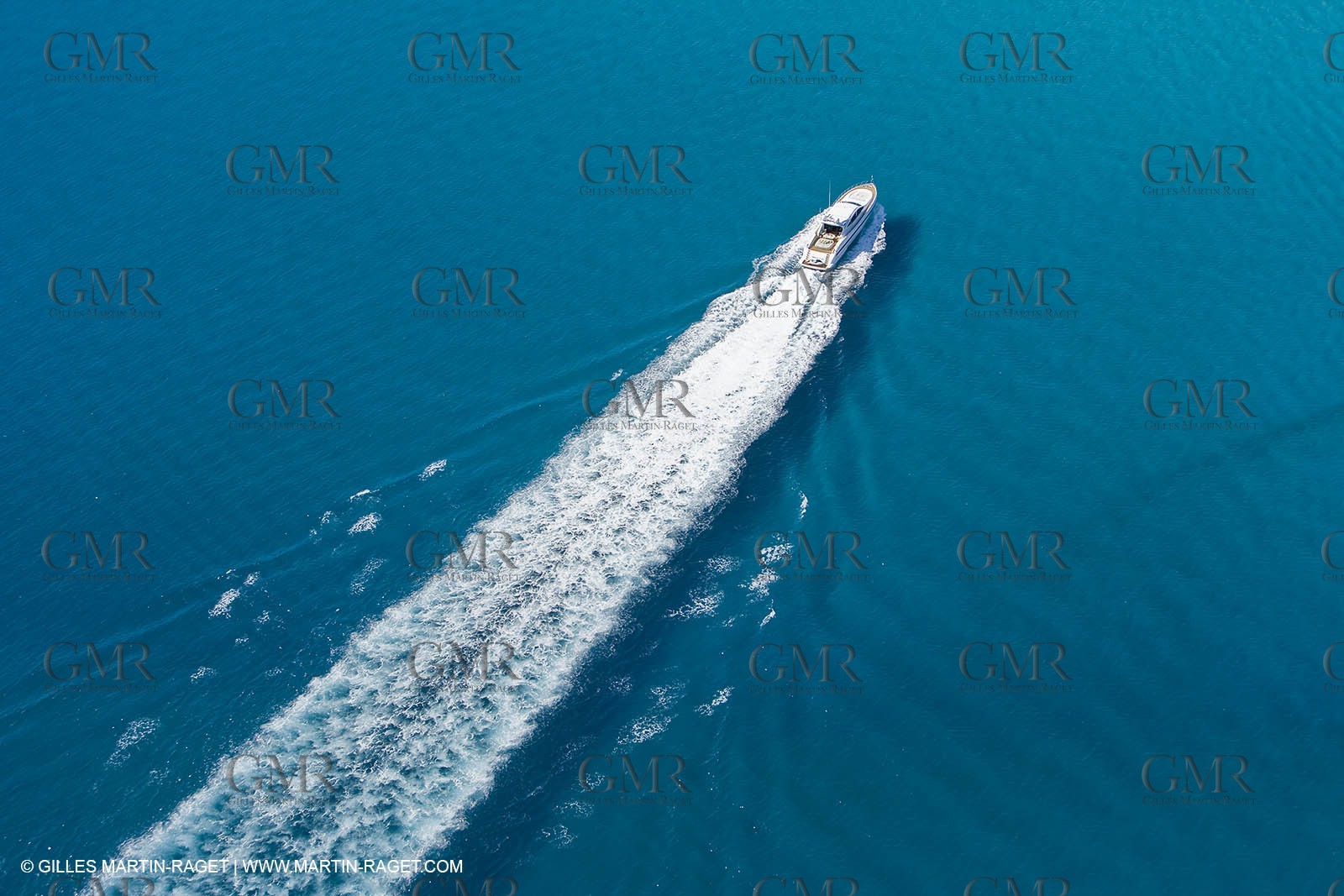 06 09 2007 - Saint Tropez (FRA, 83) - Superyachts - Motoryachts - Mangusta 92 Triple Fun in Saint Tropez - Mooring at Club 55 at Pampelonne Beach
